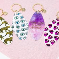 The Sis Kiss Motel Keychains